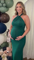 emerald green halter bodycon maxi dress with elegant twisted neckline
