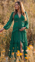 emerald green lace trim maternity maxi dress with long sleeves and tiered ruffle skirt