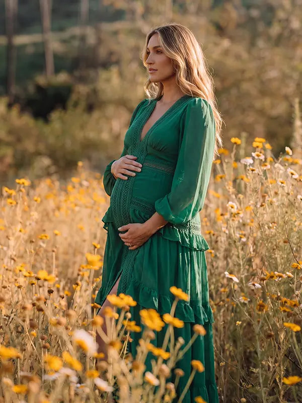 emerald green lace trim maternity maxi dress with long sleeves and tiered ruffle skirt