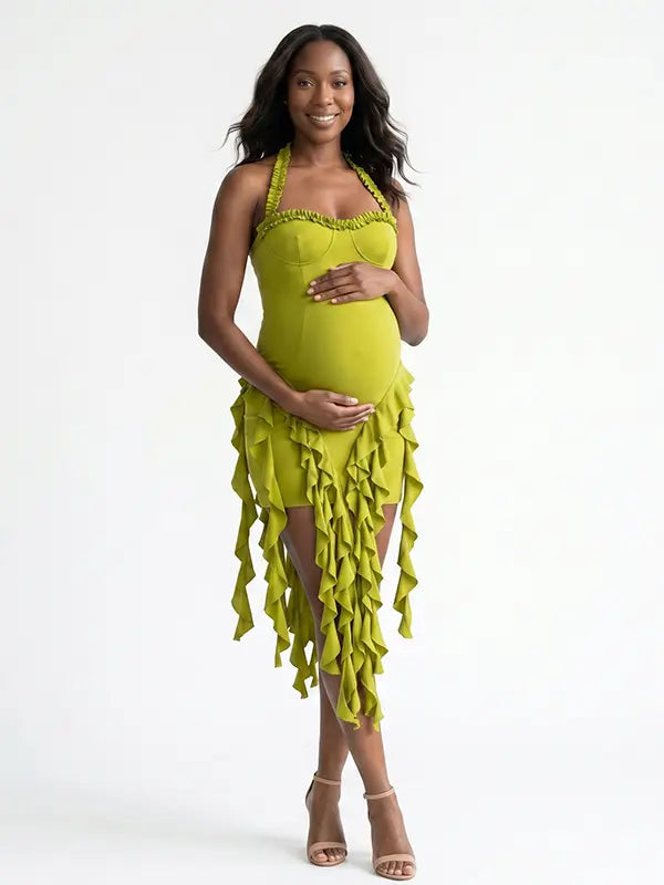 green ruffle maternity dress with halter neckline and asymmetrical frill hem