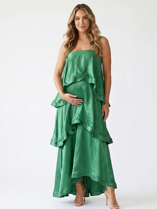 green tiered ruffle maternity maxi dress with spaghetti straps and layered ruffles