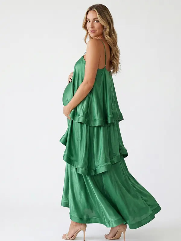 green tiered ruffle maternity maxi dress with spaghetti straps and layered ruffles
