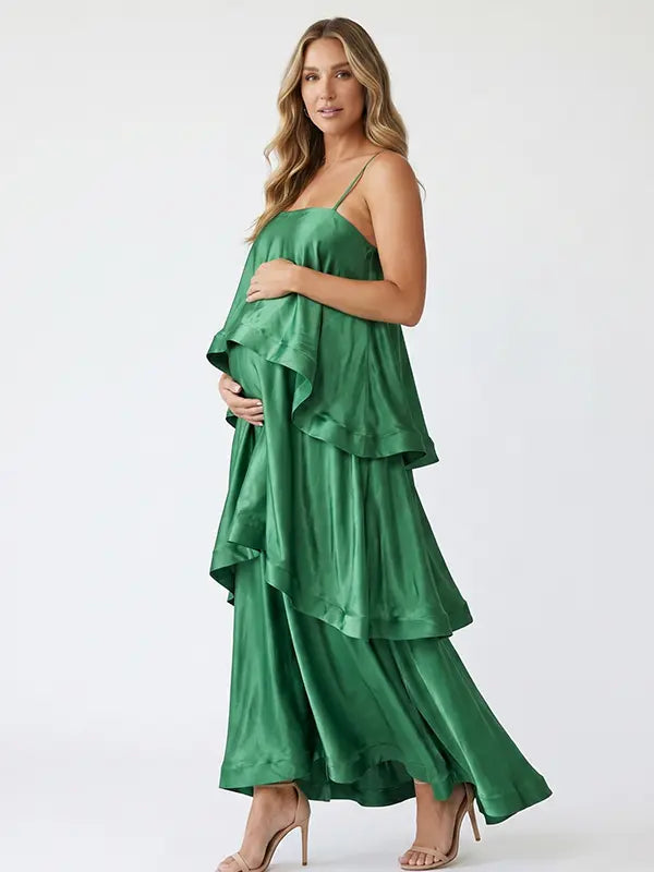 green tiered ruffle maternity maxi dress with spaghetti straps and layered ruffles