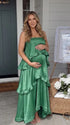 green tiered ruffle maternity maxi dress with spaghetti straps and layered ruffles