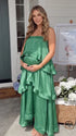 green tiered ruffle maternity maxi dress with spaghetti straps and layered ruffles