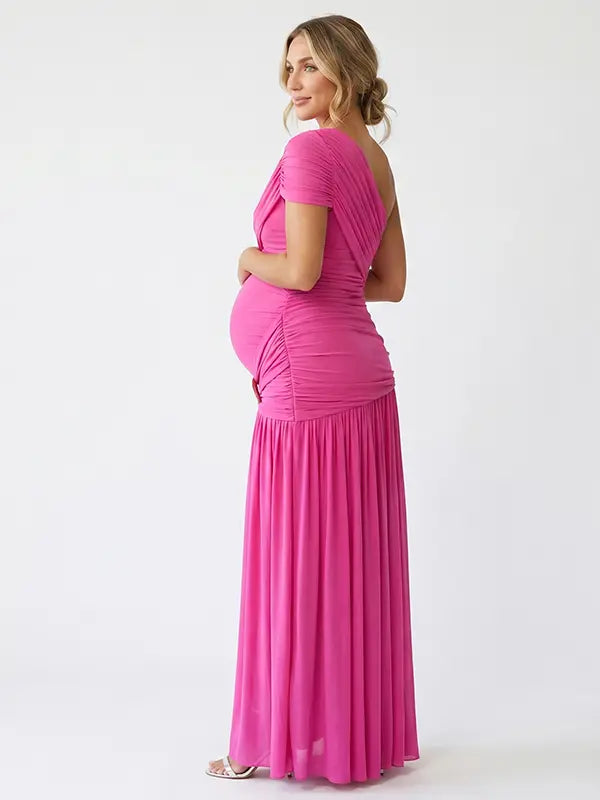 Hot pink one shoulder maternity gown with ruched silhouette and high slit for Barbie baby shower celebrations
