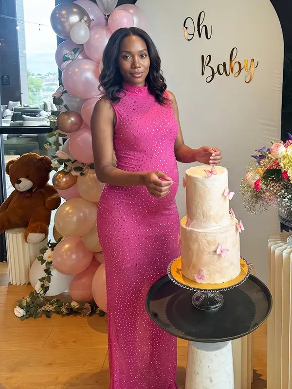 hot pink rhinestone maternity gown with mock neck and mermaid silhouette