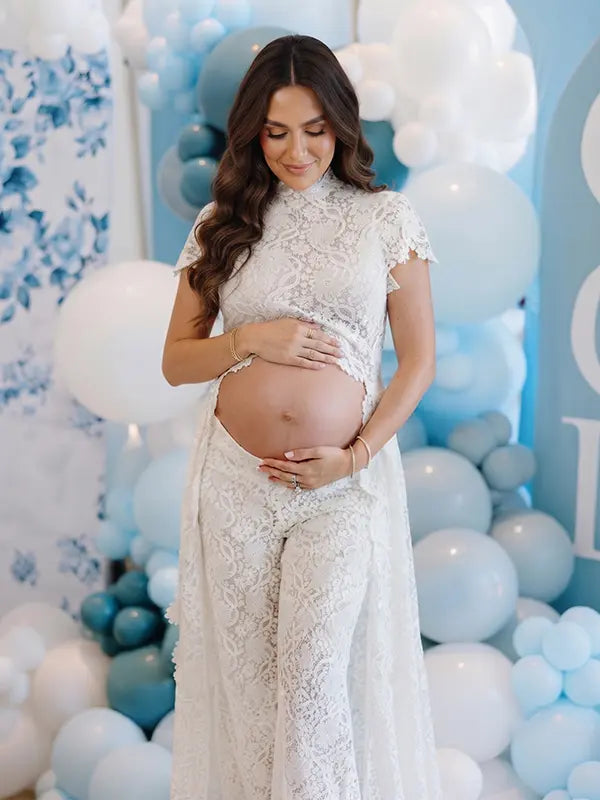 Ivory Lace Two Piece Maternity Photoshoot Pants Set with High Neck Crop Top, Open Belly Design and Wide Leg Pants for Pregnancy Announcement, Studio Portrait, Baby Shower and Fine Art Maternity Photography | Bumplook