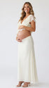 Ivory Ruffle Two Piece Maternity Photoshoot Outfit Featuring an Open Belly Design and Flowing Maxi Skirt for Pregnancy Photography, Studio Maternity Portraits and Pregnancy Announcements | Bumplook