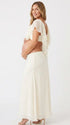 Ivory Ruffle Two Piece Maternity Photoshoot Outfit Featuring an Open Belly Design and Flowing Maxi Skirt for Pregnancy Photography, Studio Maternity Portraits and Pregnancy Announcements | Bumplook