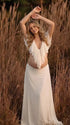 Ivory Ruffle Two Piece Maternity Photoshoot Outfit Featuring an Open Belly Design and Flowing Maxi Skirt for Pregnancy Photography, Studio Maternity Portraits and Pregnancy Announcements | Bumplook
