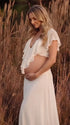 Ivory Ruffle Two Piece Maternity Photoshoot Outfit Featuring an Open Belly Design and Flowing Maxi Skirt for Pregnancy Photography, Studio Maternity Portraits and Pregnancy Announcements | Bumplook