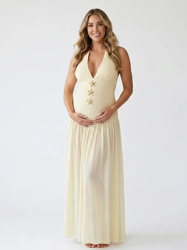 Ivory starfish halter maternity maxi dress with lace-up back and flowing chiffon skirt for beach baby shower and coastal maternity photoshoot