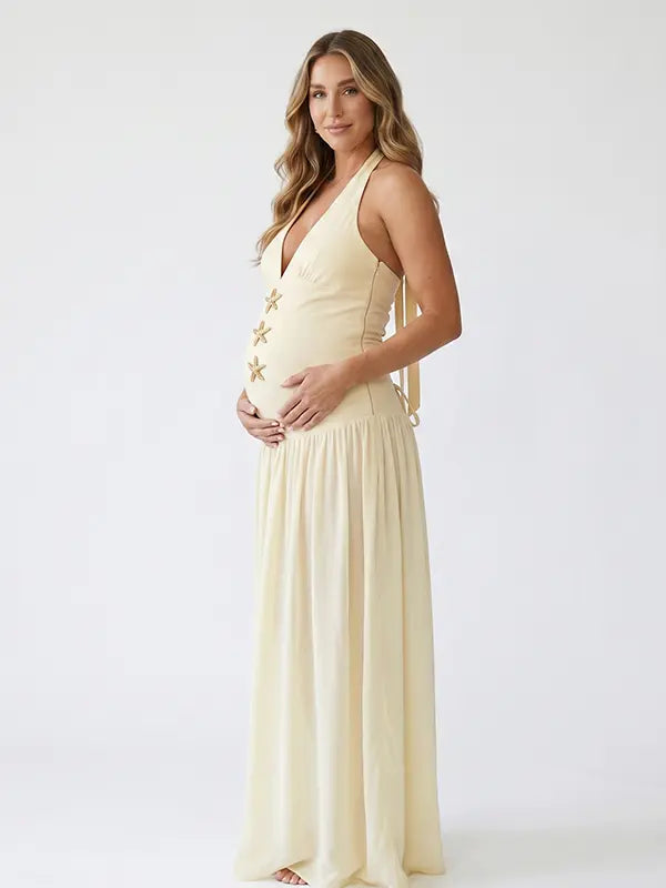 Ivory starfish halter maternity maxi dress with lace-up back and flowing chiffon skirt for beach baby shower and coastal maternity photoshoot