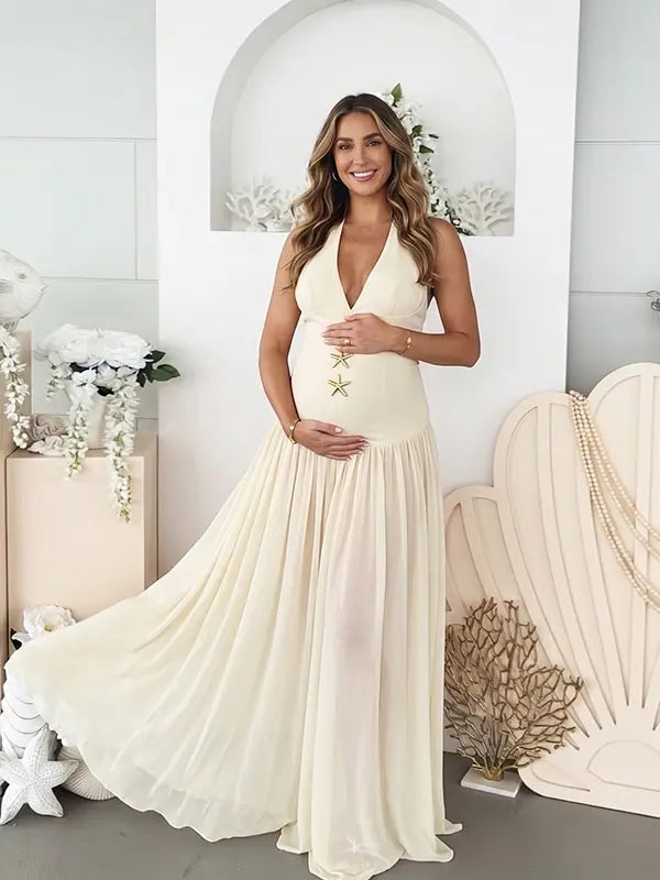 Ivory starfish halter maternity maxi dress with lace-up back and flowing chiffon skirt for beach baby shower and coastal maternity photoshoot