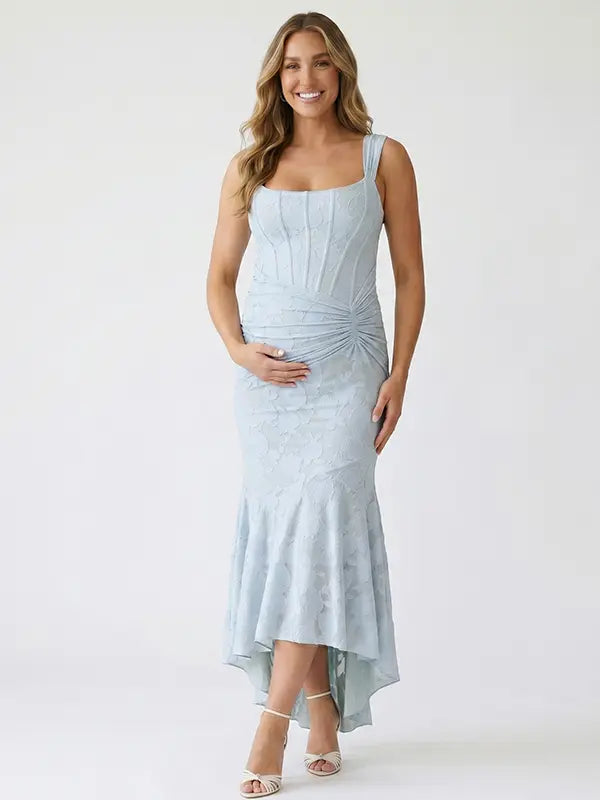 light blue jacquard maternity midi dress with corset bodice and high low hem
