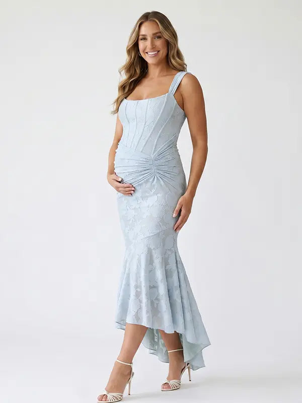 light blue jacquard maternity midi dress with corset bodice and high low hem