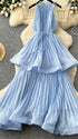 flowy light blue maternity dress with removable waist tie and layered pleated skirt