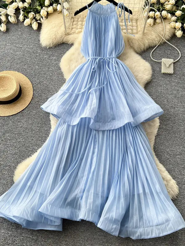 flowy light blue maternity dress with removable waist tie and layered pleated skirt
