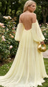 Pregnant woman wearing elegant open back maternity dress