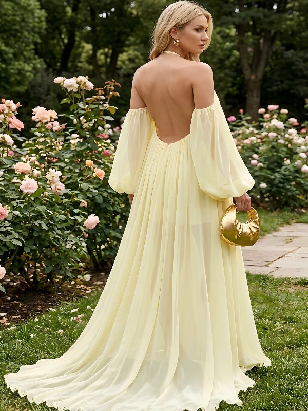 Pregnant woman wearing elegant open back maternity dress