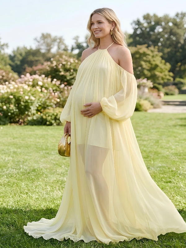 Side view of pregnant woman wearing light yellow maternity dress for baby shower and photoshoot 