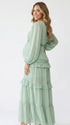 mint green lace trim maternity maxi dress with long sleeves and flowy tiered skirt