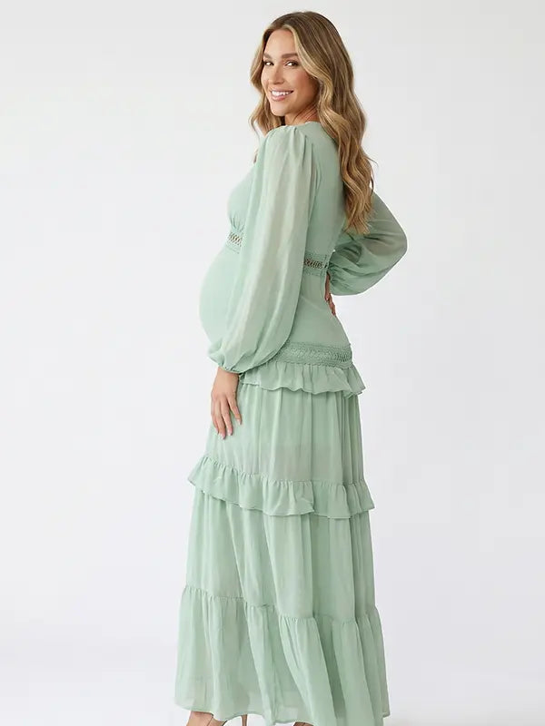 mint green lace trim maternity maxi dress with long sleeves and flowy tiered skirt