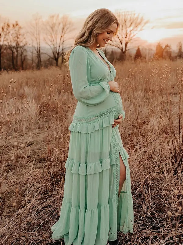mint green lace trim maternity maxi dress with long sleeves and flowy tiered skirt