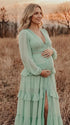 mint green lace trim maternity maxi dress with long sleeves and flowy tiered skirt