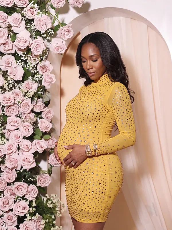 mustard yellow rhinestone maternity mini dress with long sleeves and bodycon fit