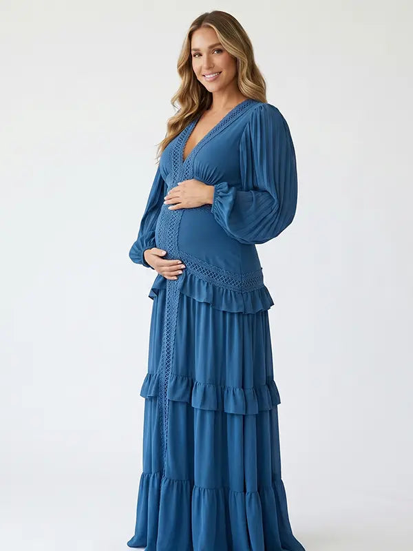 navy blue lace trim maternity maxi dress with long sleeves and flowing tiered skirt