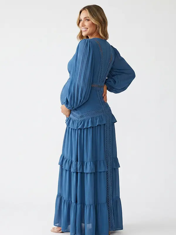 navy blue lace trim maternity maxi dress with long sleeves and flowing tiered skirt