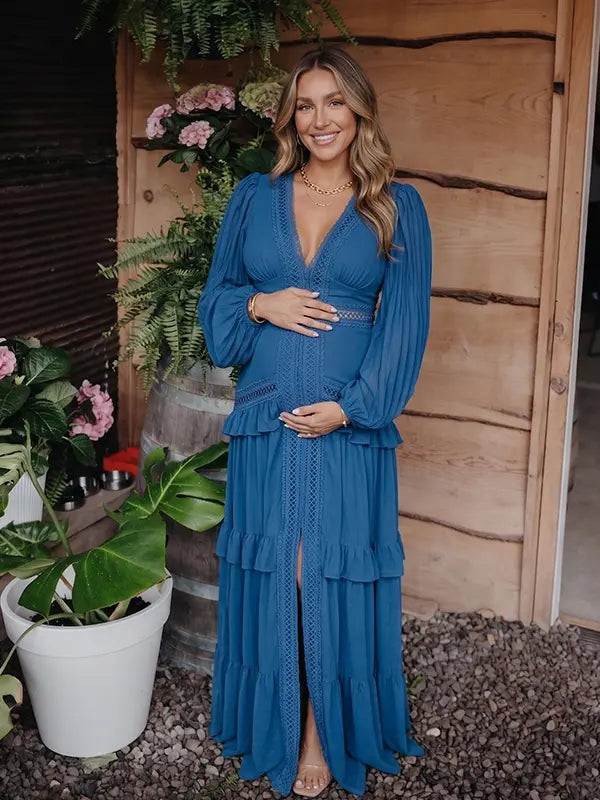 navy blue lace trim maternity maxi dress with long sleeves and flowing tiered skirt