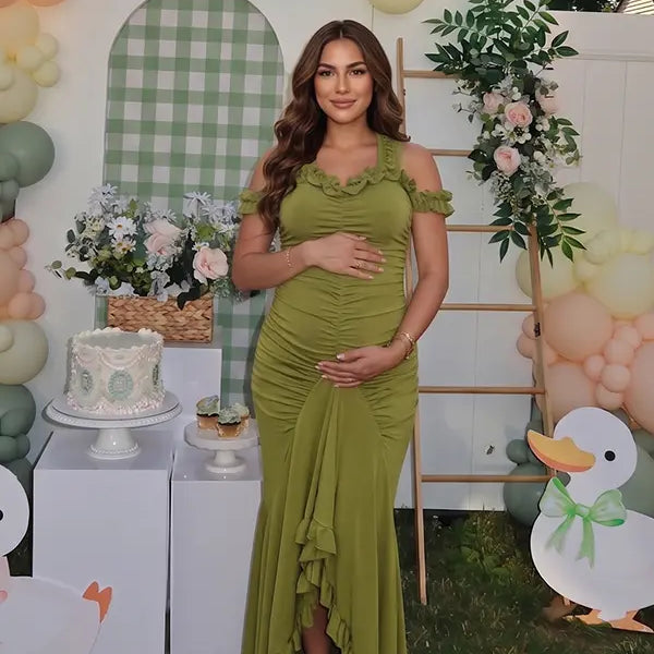 Olive green ruffle halter maternity maxi dress with ruched bodycon fit and flowing high-low hem