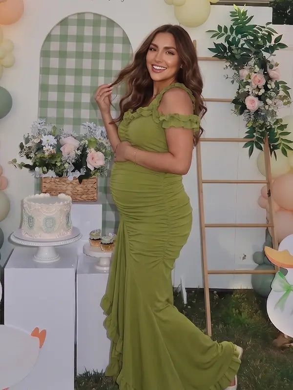 Olive green ruffle halter maternity maxi dress with ruched bodycon fit and flowing high-low hem