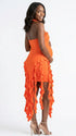 orange ruffle maternity dress with halter neckline and asymmetrical frill hem