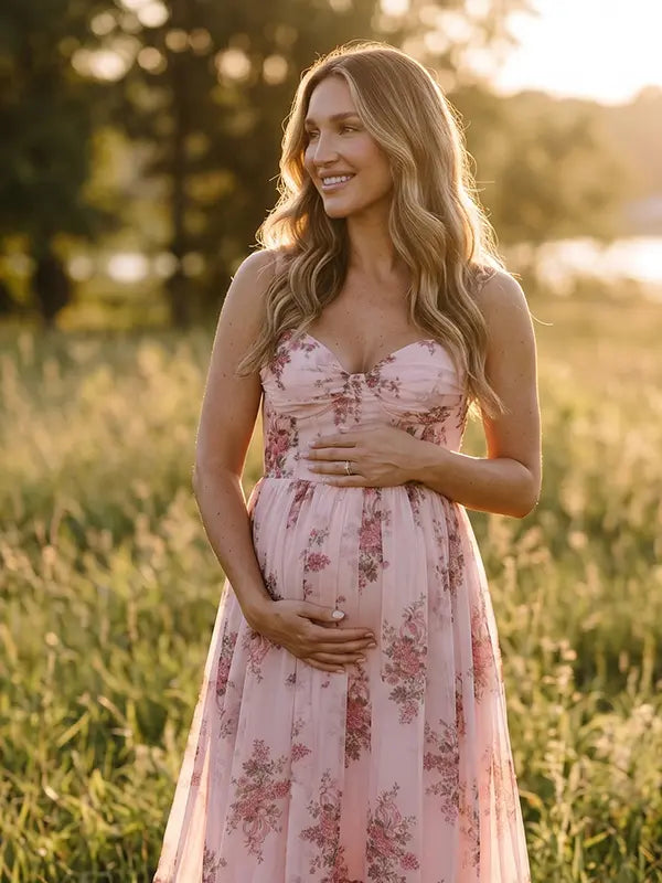 pink floral corset maternity maxi dress with full skirt and structured bodice