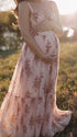 pink floral corset maternity maxi dress with full skirt and structured bodice