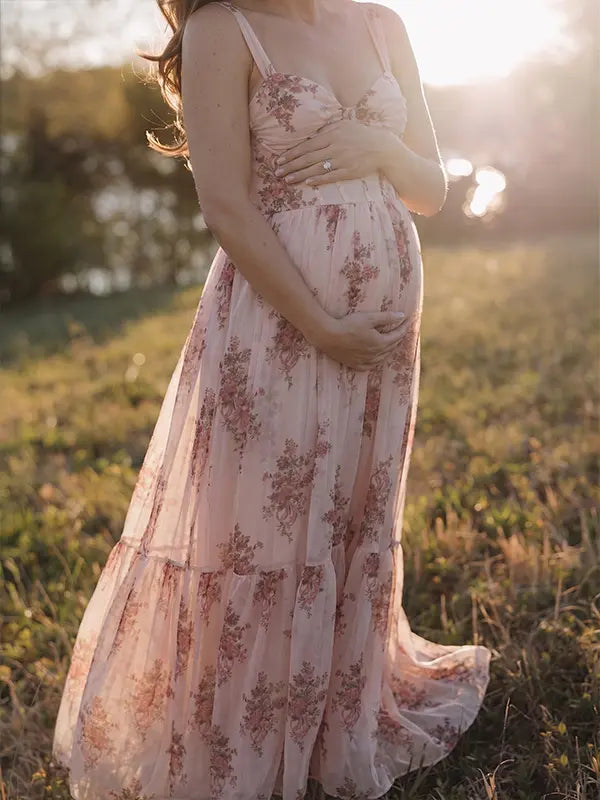 pink floral corset maternity maxi dress with full skirt and structured bodice