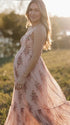 pink floral corset maternity maxi dress with full skirt and structured bodice