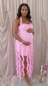 pink ruffle maternity dress with halter neckline and asymmetrical frill hem