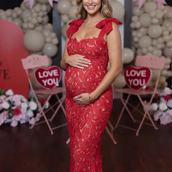 red lace maternity maxi dress with adjustable bow shoulder straps