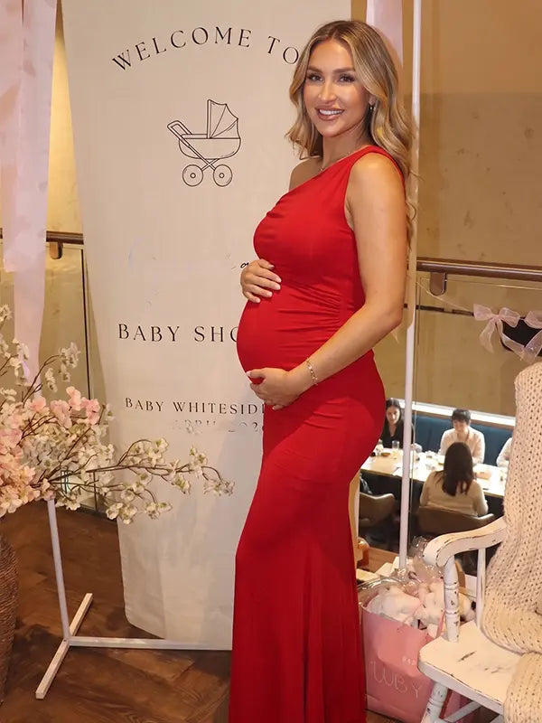 red solid off shoulder maternity maxi dress with bodycon silhouette