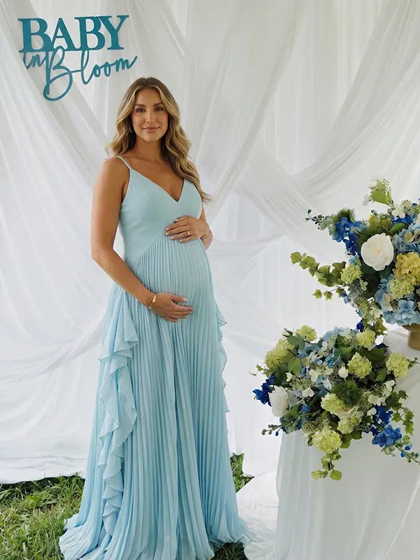 Sky blue boho pleated maternity maxi dress with cascading ruffle details for beach maternity photoshoots