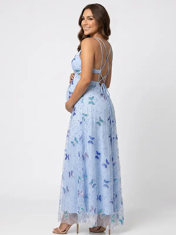 Fairy-inspired sky blue maternity photoshoot dress with butterfly details
