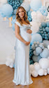 sky blue cowl neck maternity gown with open back detail and flowing silhouette