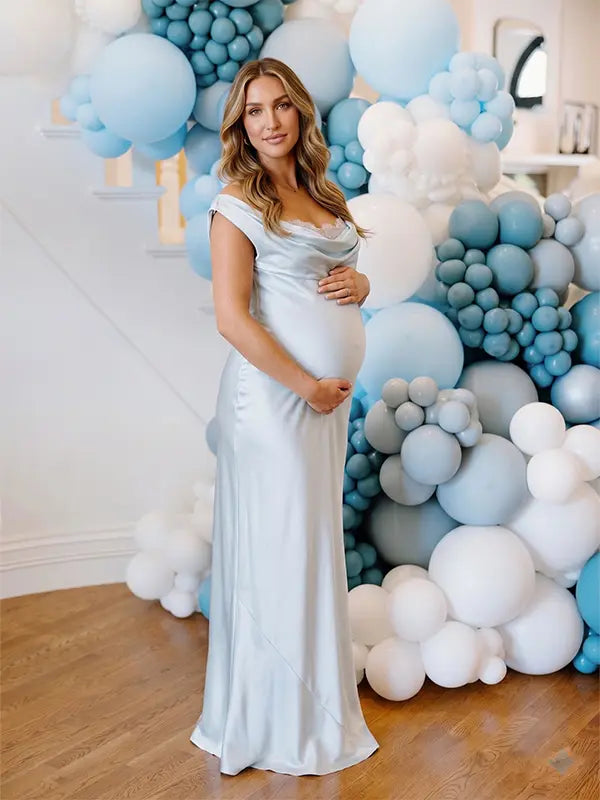 sky blue cowl neck maternity gown with open back detail and flowing silhouette