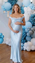 sky blue cowl neck maternity gown with open back detail and flowing silhouette