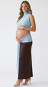 sky blue maternity crop top set with open belly design and draped maxi skirt for maternity photoshoot